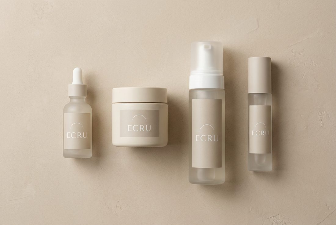 ECRU four-piece skincare line flat lay